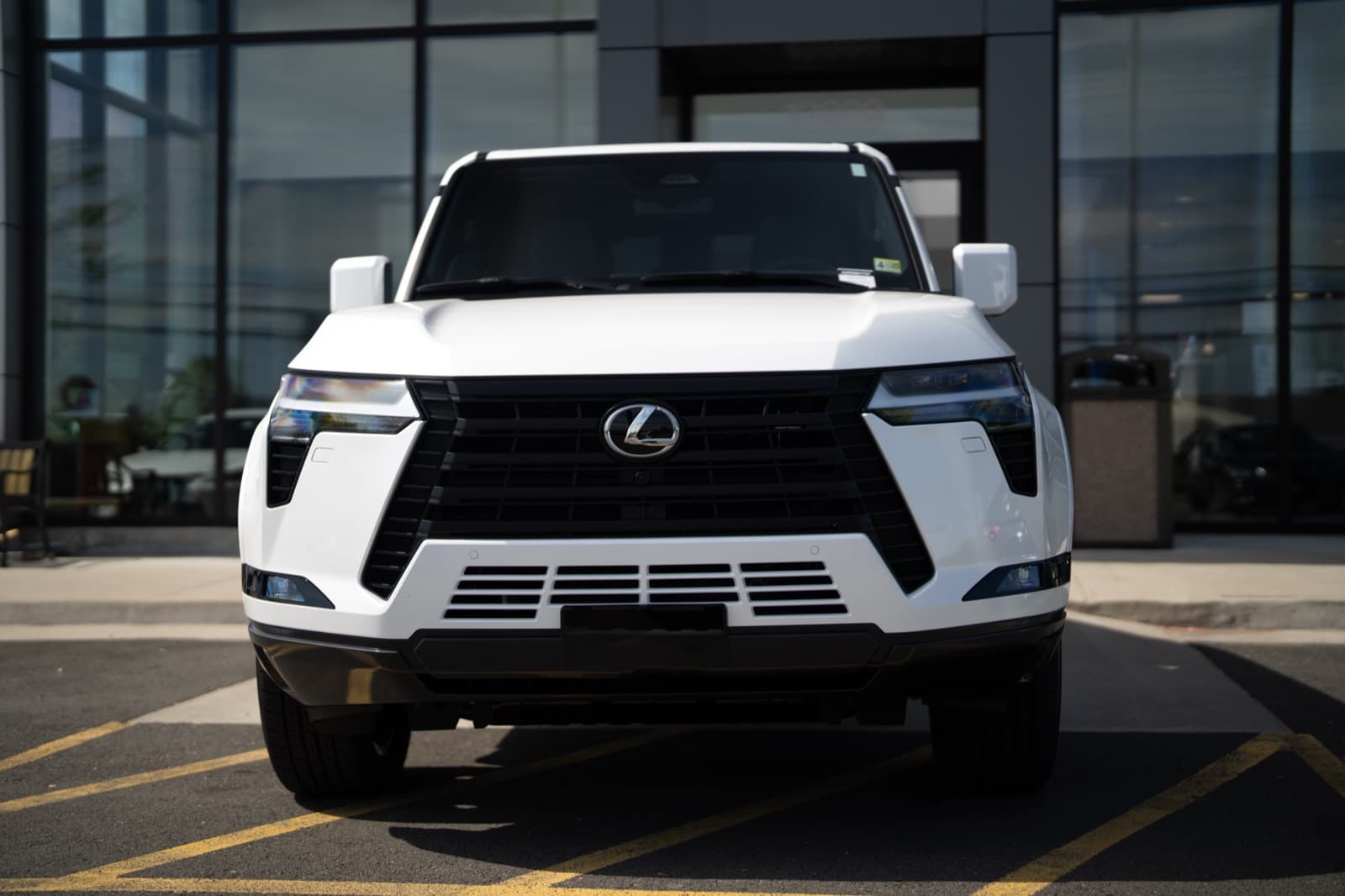 White Lexus SUV at dealership
